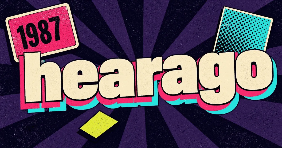 Logo de hearago en lettres rétro, avec une étiquette « 1987 » sur fond de rayons violets.